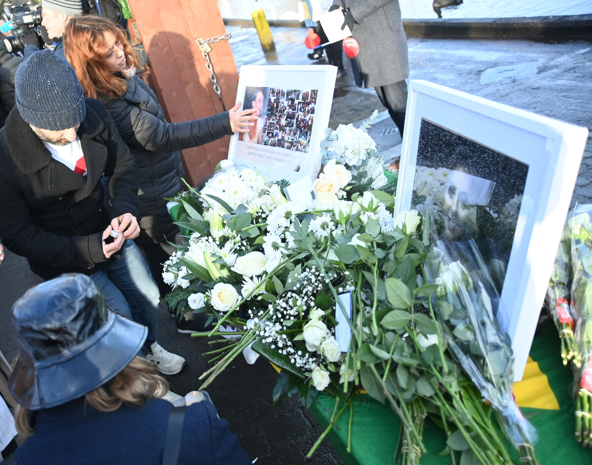 People leave flowers and light candles at the vigil for Bruna Fonseca at The Lough, Cork, on Sunday January 8, 2023. Picture: Larry Cummins People leave flowers and light candles at the vigil for Bruna Fonseca at The Lough, Cork, on Sunday January 8, 2023. Picture: Larry Cummins
