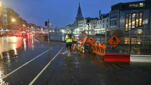 <p> High tide surges over the River Lee at South Terrace and Georges Quay as Storm Bram brings an orange weather warning to Ireland’s south coast. Picture: Dan Linehan</p>