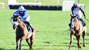 <p>Eagle Fang and Philip Byrnes (left) win the Irish Stallion Farms EBF Beginners Steeplechase from Kurasso Blue (right). Pic: Healy Racing.</p>