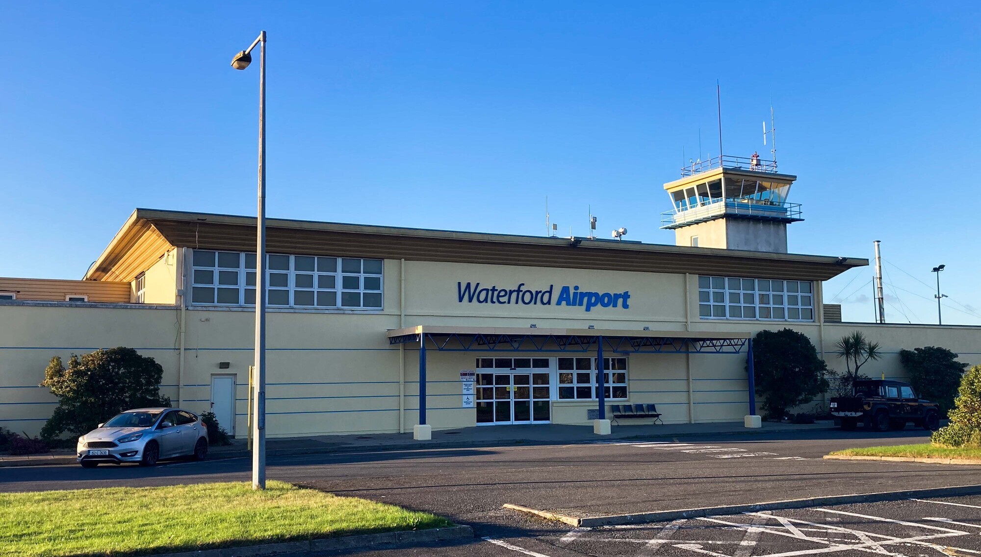 Student and instructor uninjured after light aircraft lands in field near Waterford Airport