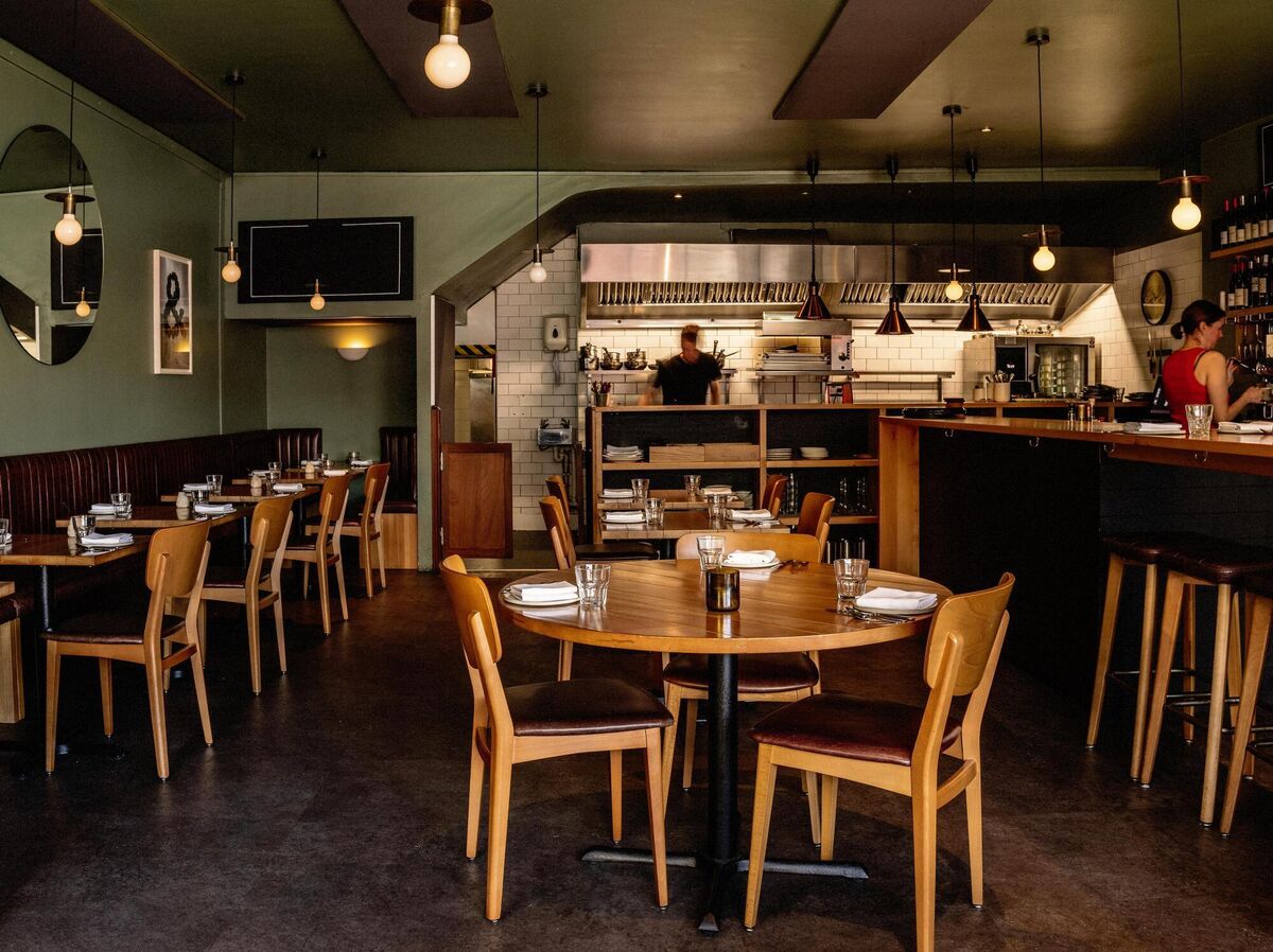 "Despite the Nordic aesthetic, it was never a cold space, and following a recent revamp, the room has been further softened. There is still blonde wood, white tiles, and an open kitchen, but the room feels warm and welcoming."