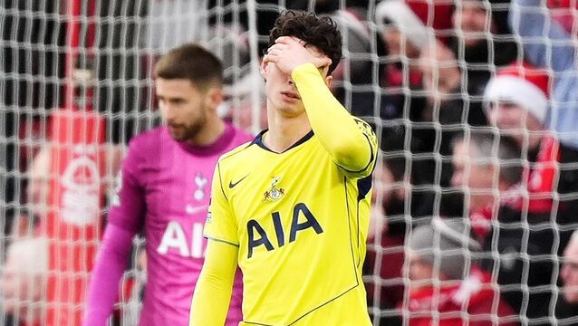 <p>Archie Gray (right) and Tottenham team-mate Guglielmo Vicario react to gifting an opening goal to Nottingham Forest’s Callum Hudson-Odoi (Mike Egerton/PA).</p>