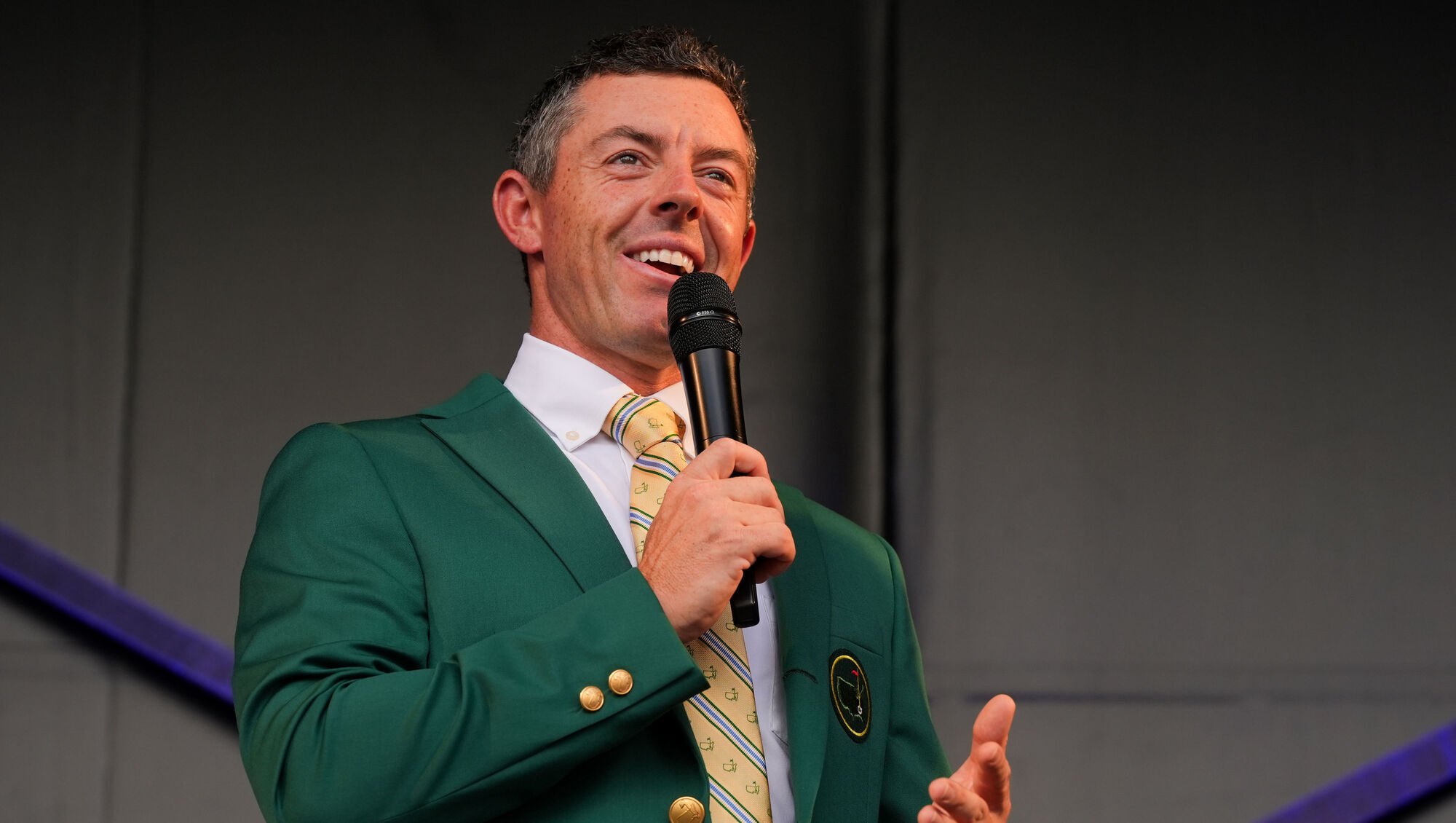 CAREER HIGH: Rory McIlroy, sporting his green Masters jacket, speaks to supporters. Pic: Brian Lawless/PA Wire.