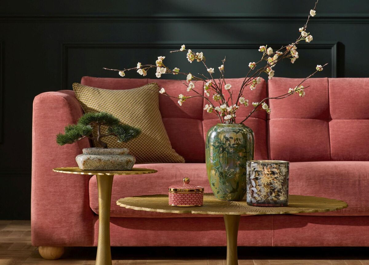  Browsing the bargains might throw up a coffee table and rug to go with a new sofa purchase. Picture: Next