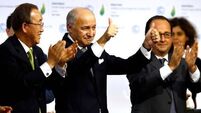 VIDEO: Applause greets Paris Agreement climate deal despite concerns from activists