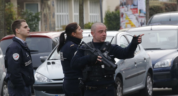 Police officers patrol near a pre-school. Pic: AP