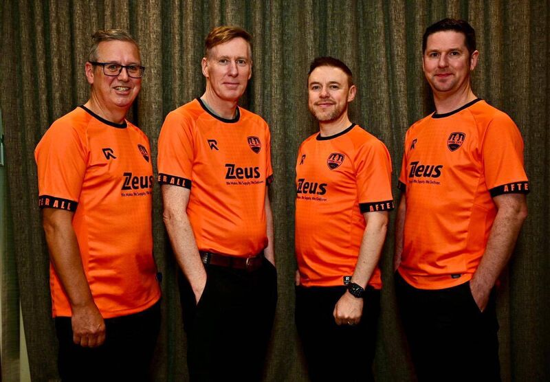 The Frank and Walters modelling a Cork City FC  jersey designed with the band. 