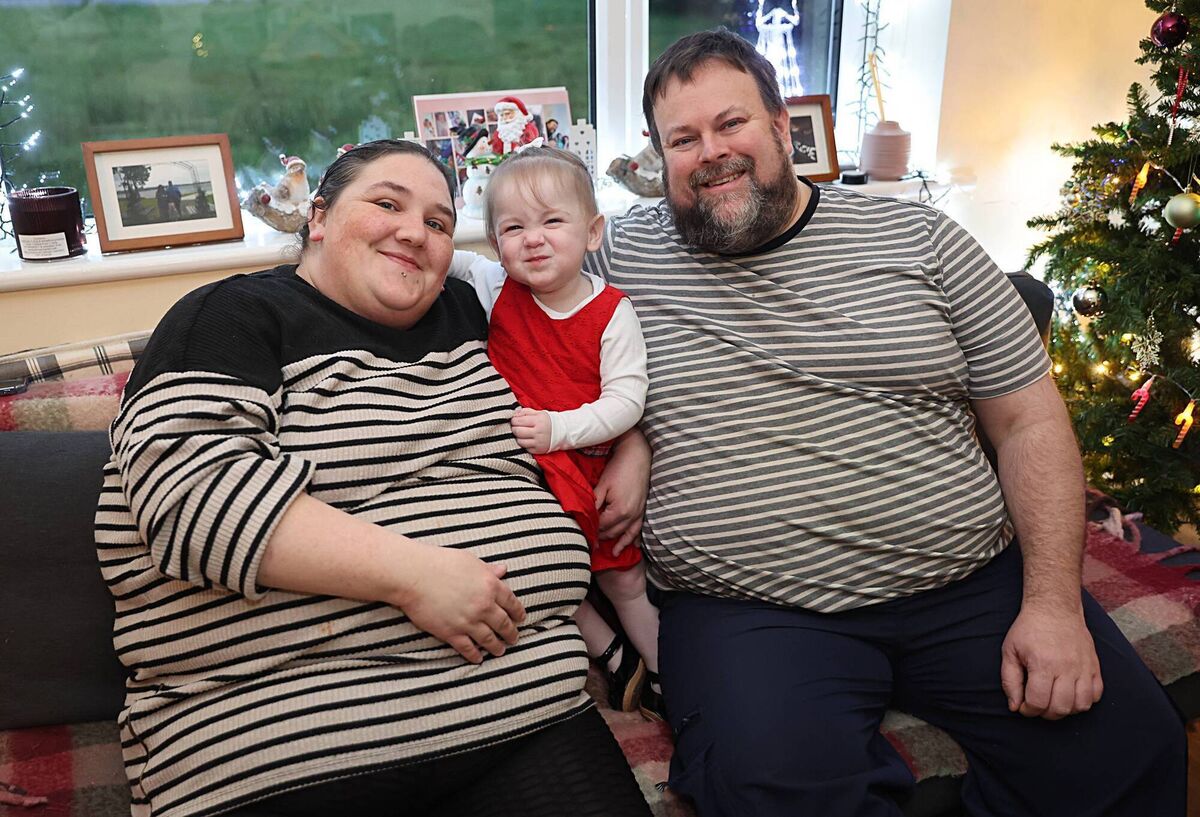 Aoife Smith, who spent 19 months in hospital, with her parents Colleen and Toby at their home outside Bailieborough, Co Cavan. Picture: Lorraine Teevan