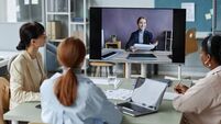 Business Women at Video Conference Call in Office
