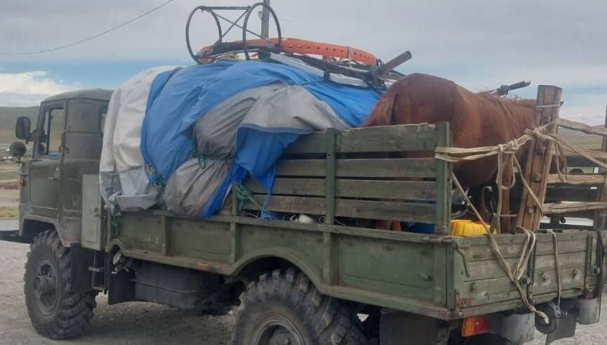 Movement of family and yurt to new pasturelands.