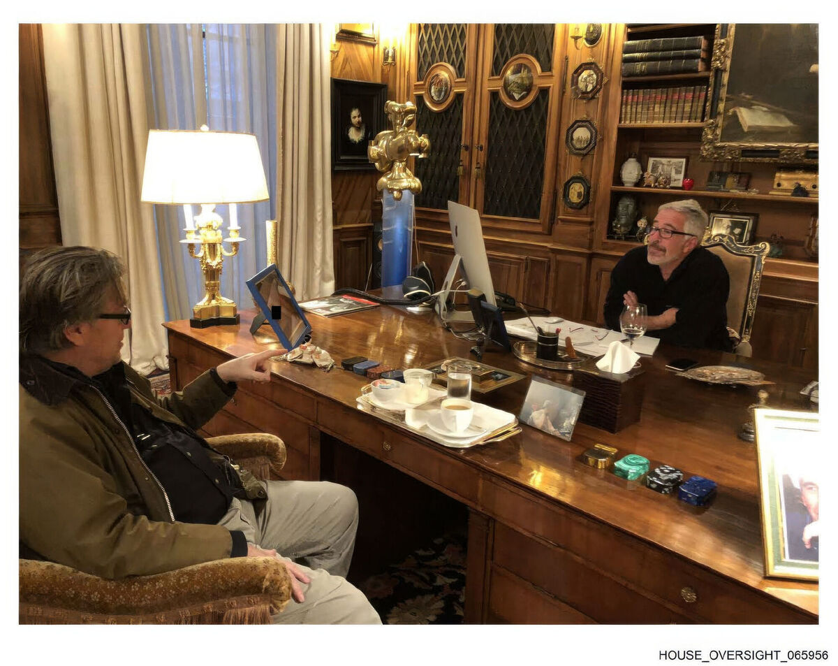 Jeffrey Epstein talking with Steve Bannon. (House Oversight Committee via AP)