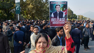 Supporters of Pakistan’s imprisoned former PM Imran Khan (A Sheikh/AP)