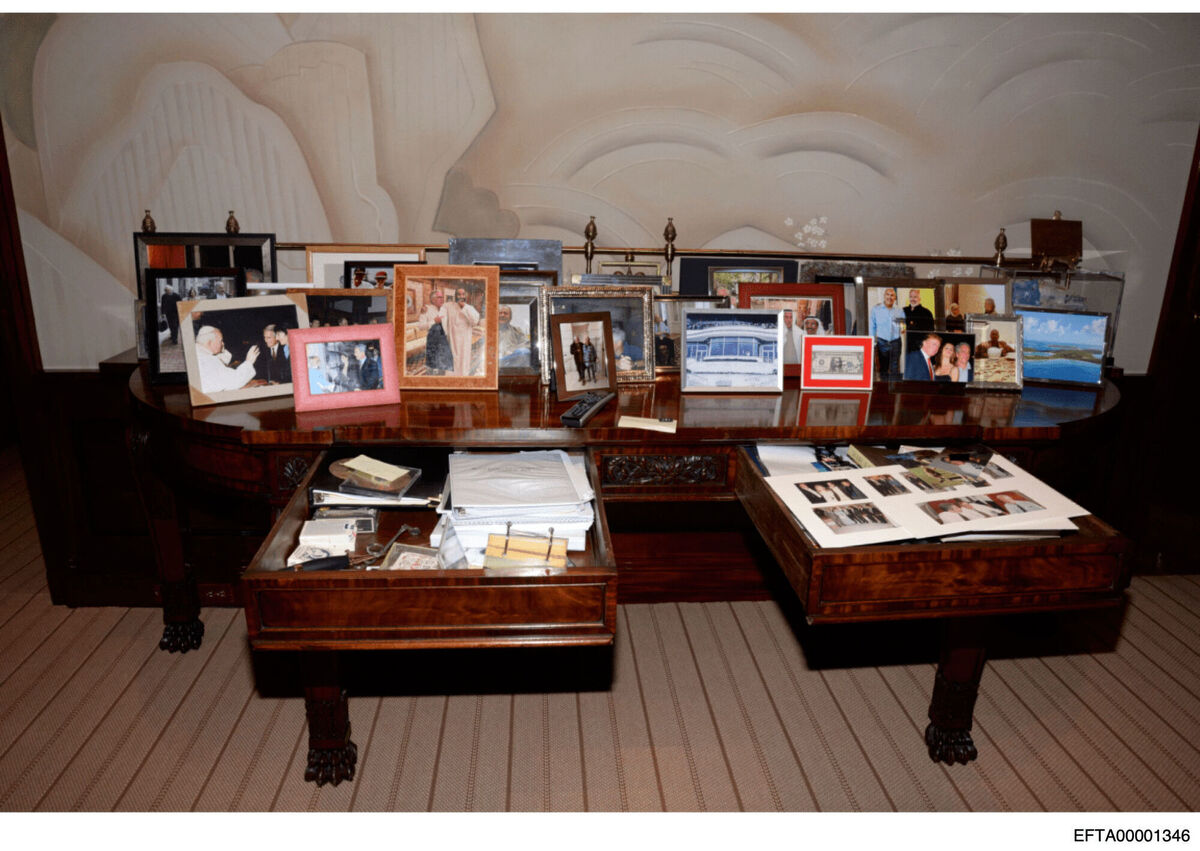 This redacted photo released by the U.S. Department of Justice shows a desk, documented on July 6, 2019, during a search of Jeffrey Epstein's home in New York. (U.S. Department of Justice via AP)