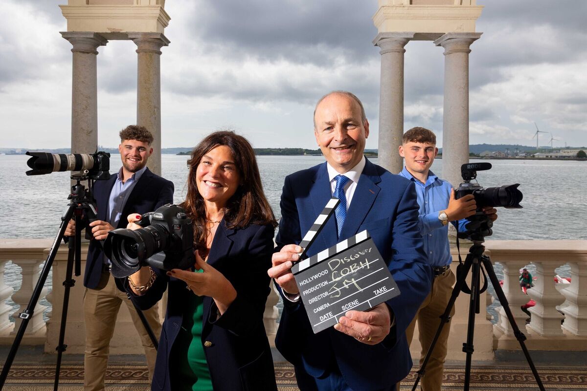 Johanna Murphy and Taoiseach Micheál Martin  with George Radley Jr &amp; David Radley, celebrating the launch of the new cinematic tribute to Cobh, produced by Johanna Murphy &amp; Sons, at the Sirius Arts Centre, Cobh, in July.