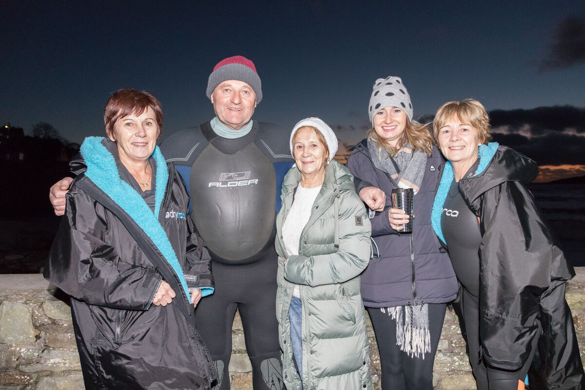 Catherine Linehan, Bernard and Phil Geoghegan with Katie and Claire Stewart at the Christmas Day swim in Fountainstown, Co. Cork. - Picture: David Creedon