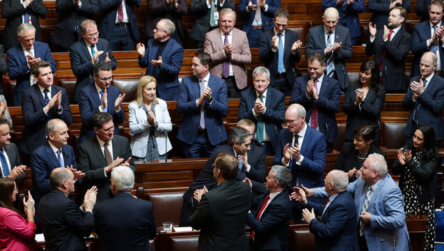 <p>TDs applaud Simon Harris on his nomination as taoiseach in 2024. Among his Fine Gael colleagues in the photo are Peter Burke, Patrick O’Donovan, and Jennifer Carroll MacNeill — as is Neale Richmond, who may have been overlooked for a Cabinet nod. File picture: Maxwells</p>