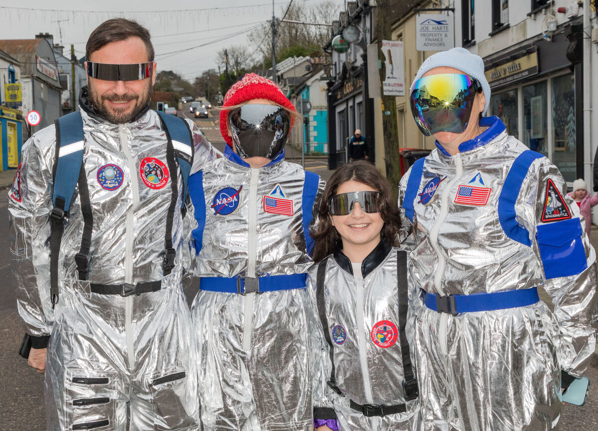 George Evangelou, Richelle Clancy, Cleopatra Evangelou and Niamh Clancy dressed as astronauts at the Wren Boys Street Festival on St. Stephen's day in Carrigaline, Co Cork.