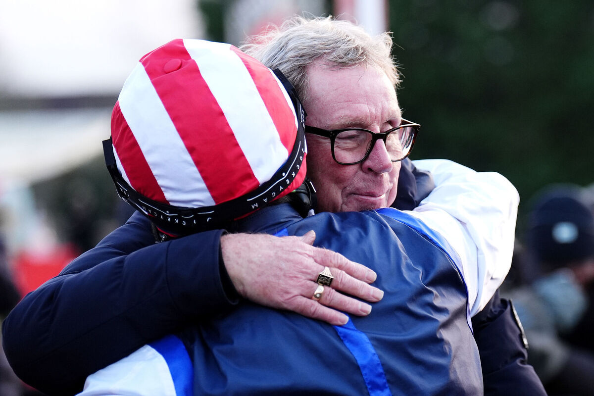 WELL DONE SON: Ben Jones (left) celebrates with Harry Redknapp after The Jukebox Man wins the Ladbrokes King George VI Chase during day one of the Ladbrokes Christmas Festival at Kempton Park Racecourse, Sunbury-on-Thames. Pic: John Walton/PA Wire