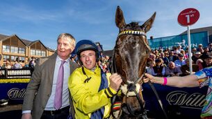 <p>MORE OF THE SAME: Trainer Barry Connell and jockey Sean Flanagan celebrate winning the Champion Chase at Punchestown with Marine Nationale last April. Pic: INPHO/Morgan Treacy</p>