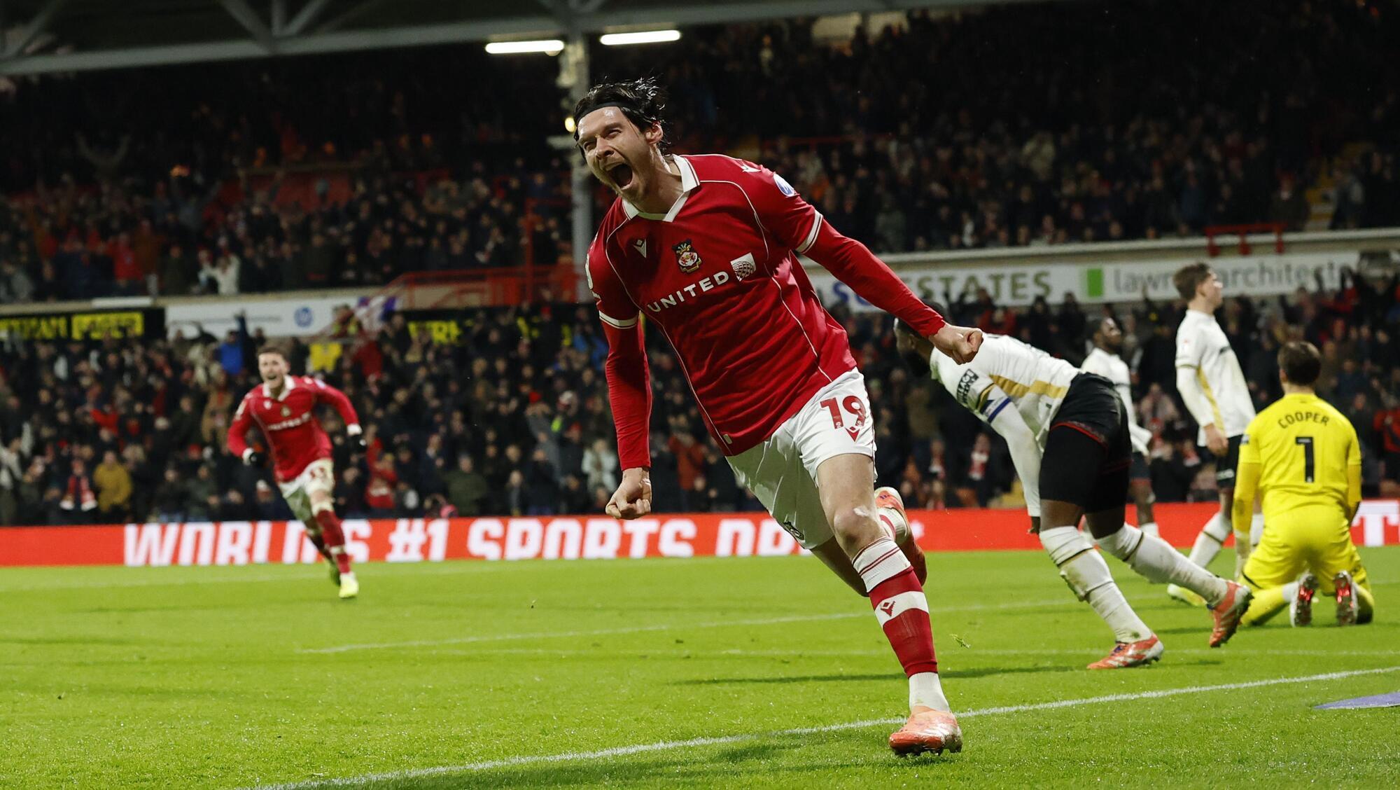 Moore's double helps Wrexham roar back and blunt Blades in festive cracker