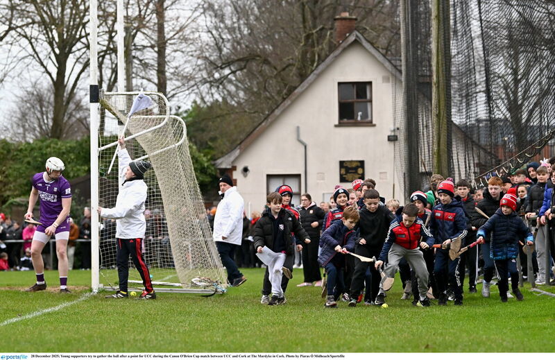 Young supporters try to gather the ball after a point for UCC during the Canon O'Brien Cup match at The Mardyke in Cork. Pic: Piaras Ó Mídheach/Sportsfile