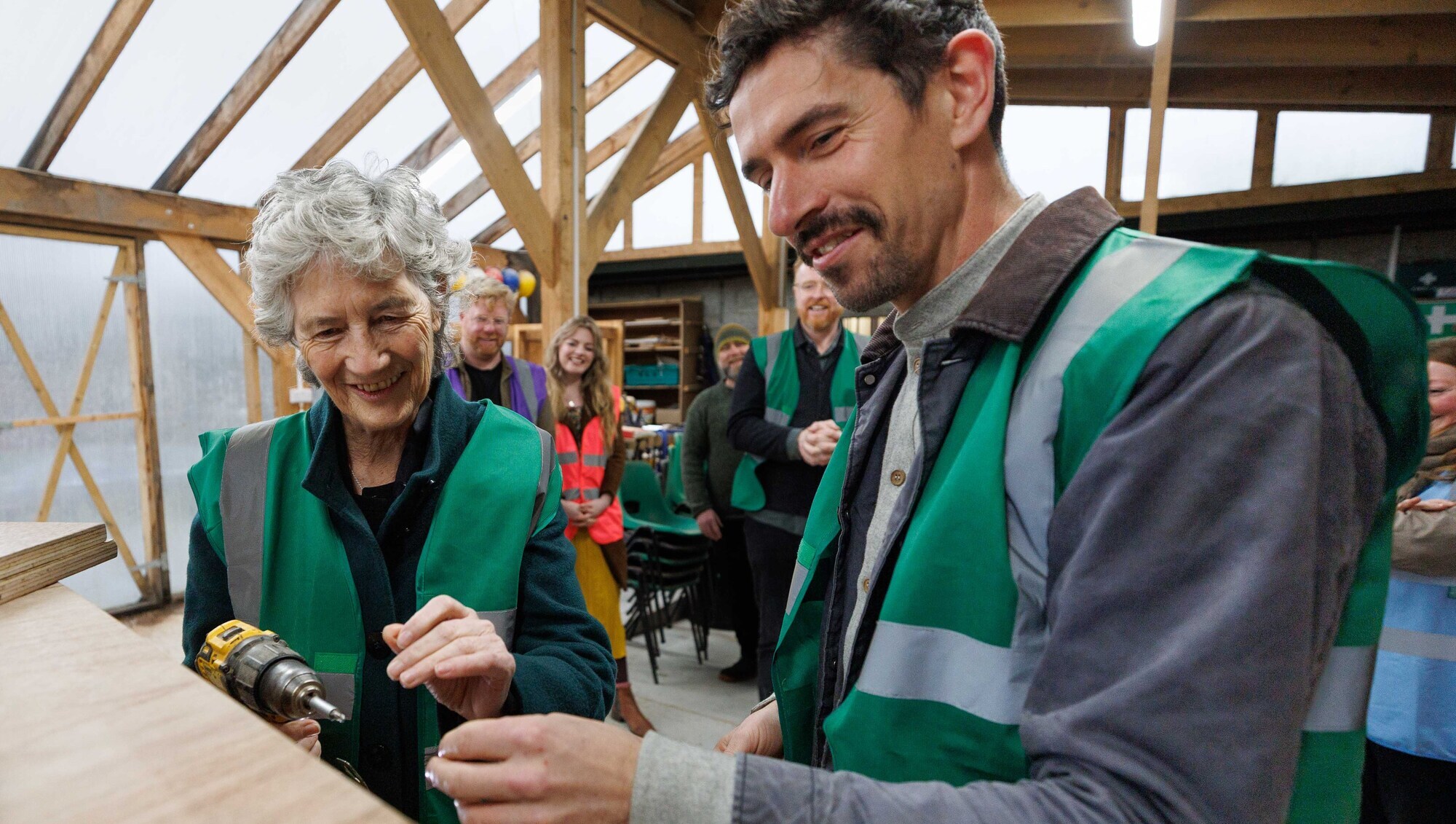 President Catherine Connolly working with instructor Cian Corcoran assembling a cabinet during her visit to Common Knowledge, the award-winning social enterprise in Co Clare earlier this month. Picture: Eamon Ward