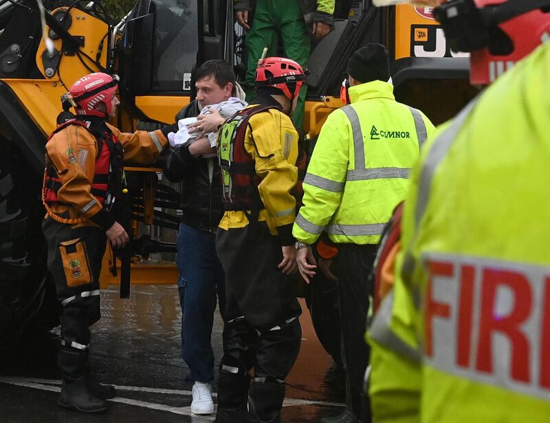  Local residents being evacuated during the Storm Babet flooding that hit Midleton, Co Cork, in October 2023. Picture: Eddie O'Hare