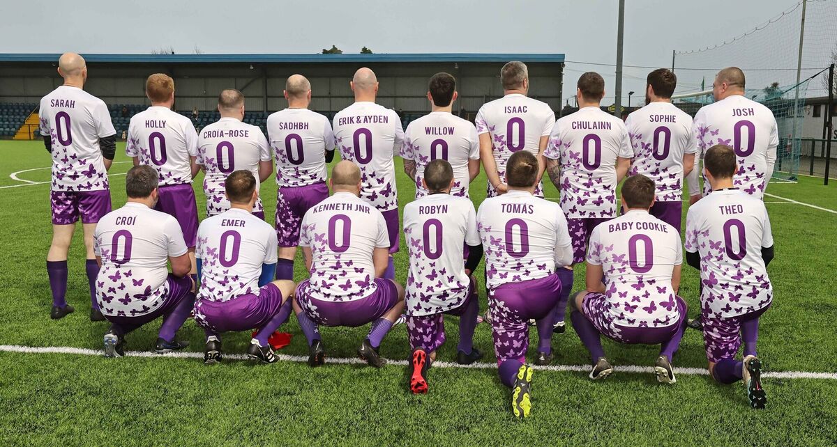 Féileacáin Fathers Cork squad ahead of a charity match in Cobh, Co Cork, earlier this year wearing shirts showing the names of their loved ones who have passed away. Picture: Jim Coughlan