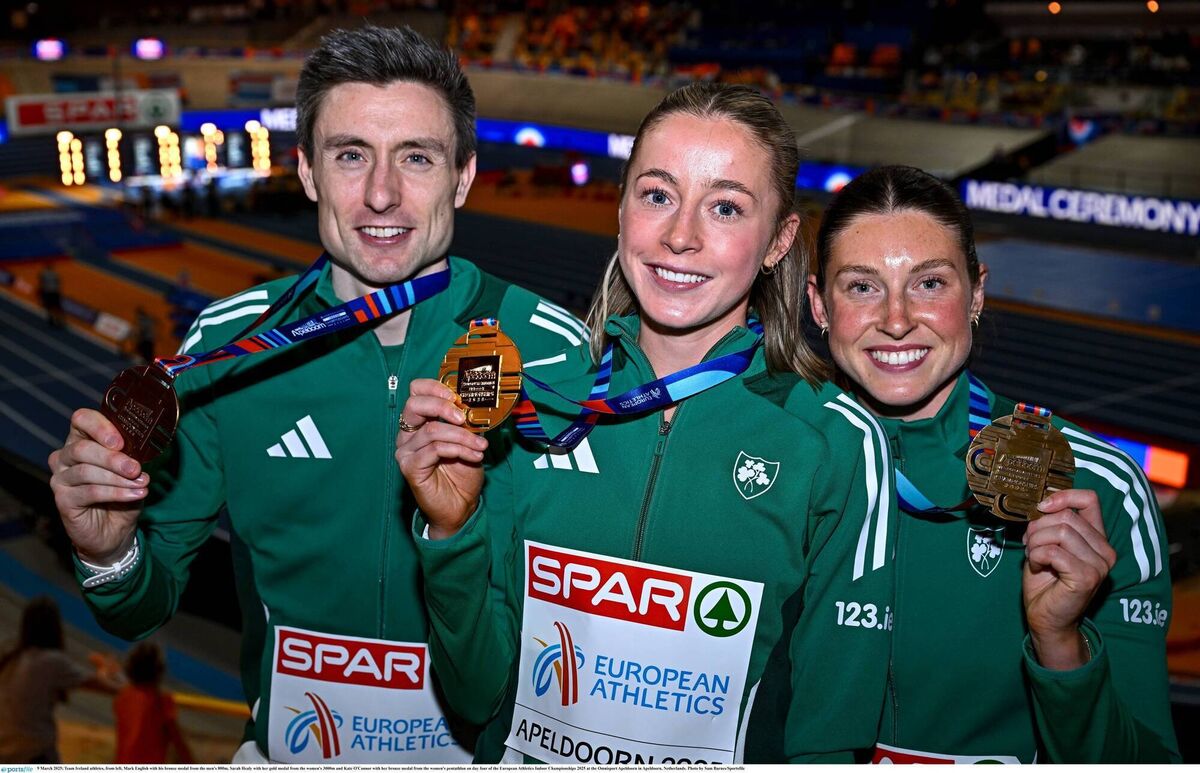 GOLDEN HALF-HOUR: Team Ireland athletes, from left, Mark English with his bronze medal from the men's 800m, Sarah Healy with her gold medal from the women's 3000m and Kate O'Connor with her bronze medal from the women's pentathlon on day four of the European Athletics Indoor Championships 2025 at the Omnisport Apeldoorn in Apeldoorn, Netherlands. Photo by Sam Barnes/Sportsfile