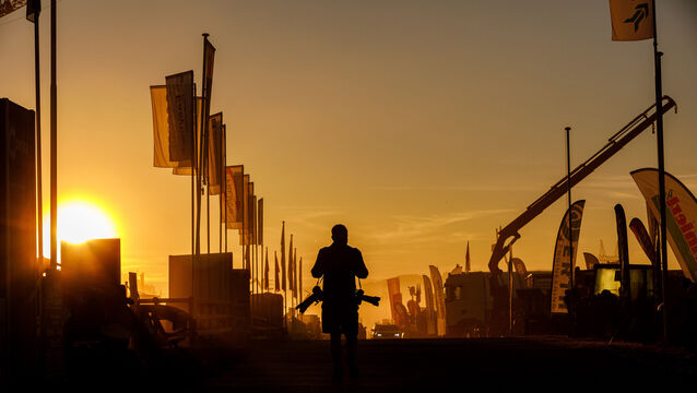 <p> Irish Examiner photographer Dan Linehan heading out at sunrise to cover the ploughing on the first day of the National Ploughing Championships at Ratheniska, Co Laois. Picture Philip Doyle, Irish Farmers Journal</p>