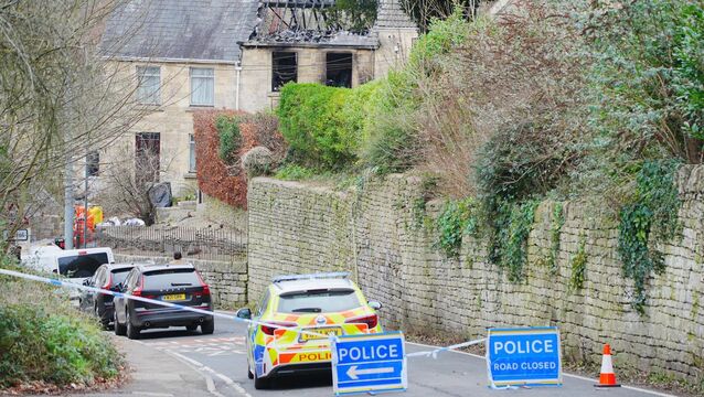 <p>Emergency services at the scene in Brimscombe Hill, near Stroud after a house fire. Picture: Ben Birchall/PA</p>