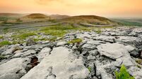 Spectacular landscape of the Burren region of County Clare, Ireland. Exposed karst limestone bedrock at the Burren National Park