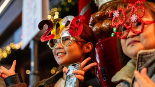 <p>People celebrate the start of 2026 in Hong Kong (Chan Long Hei/AP)</p>