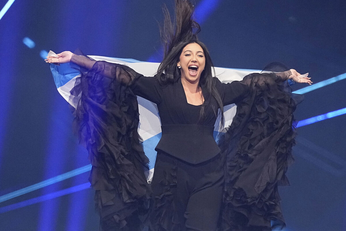 Yuval Raphael from Israel holds her country's flag during the grand final of the 69th Eurovision Song Contest in Basel, Switzerland, in May, 2025. Picture: Martin Meissner/AP