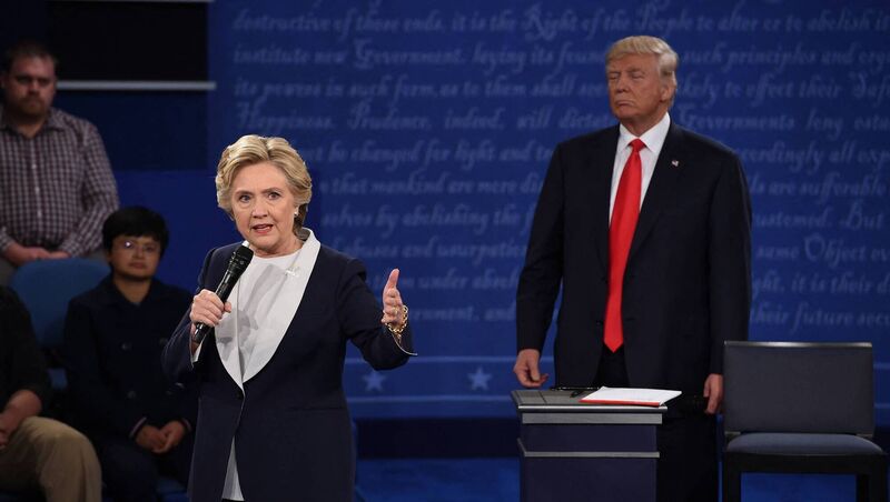 US Democratic presidential candidate Hillary Clinton and US Republican presidential candidate Donald Trump debate during the second presidential debate, October 9, 2016, Picture: Robyn Beck / AFP