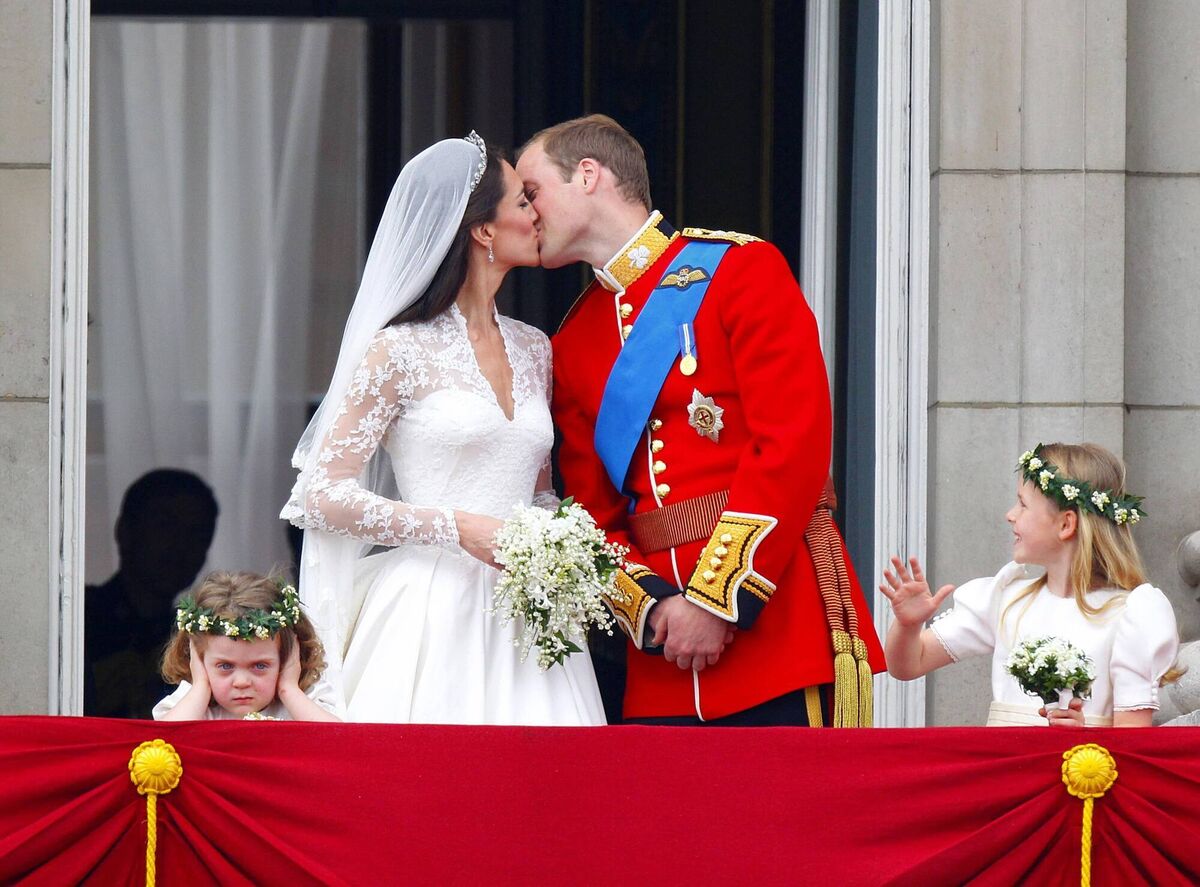 Prince William and his wife Kate Middleton kiss on the balcony of Buckingham Palace, London, following their wedding at Westminster Abbey on April 29, 2011. Picture: Chris Ison/PA Wire