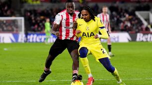 <p>Brentford’s Michael Kayode (left) and Tottenham’s Djed Spence battle for the ball during the Premier League match at the Gtech Community Stadium, London. Picture date: Thursday January 1, 2026.</p>