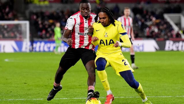 <p>Brentford’s Michael Kayode (left) and Tottenham’s Djed Spence battle for the ball during the Premier League match at the Gtech Community Stadium, London. Picture date: Thursday January 1, 2026.</p>