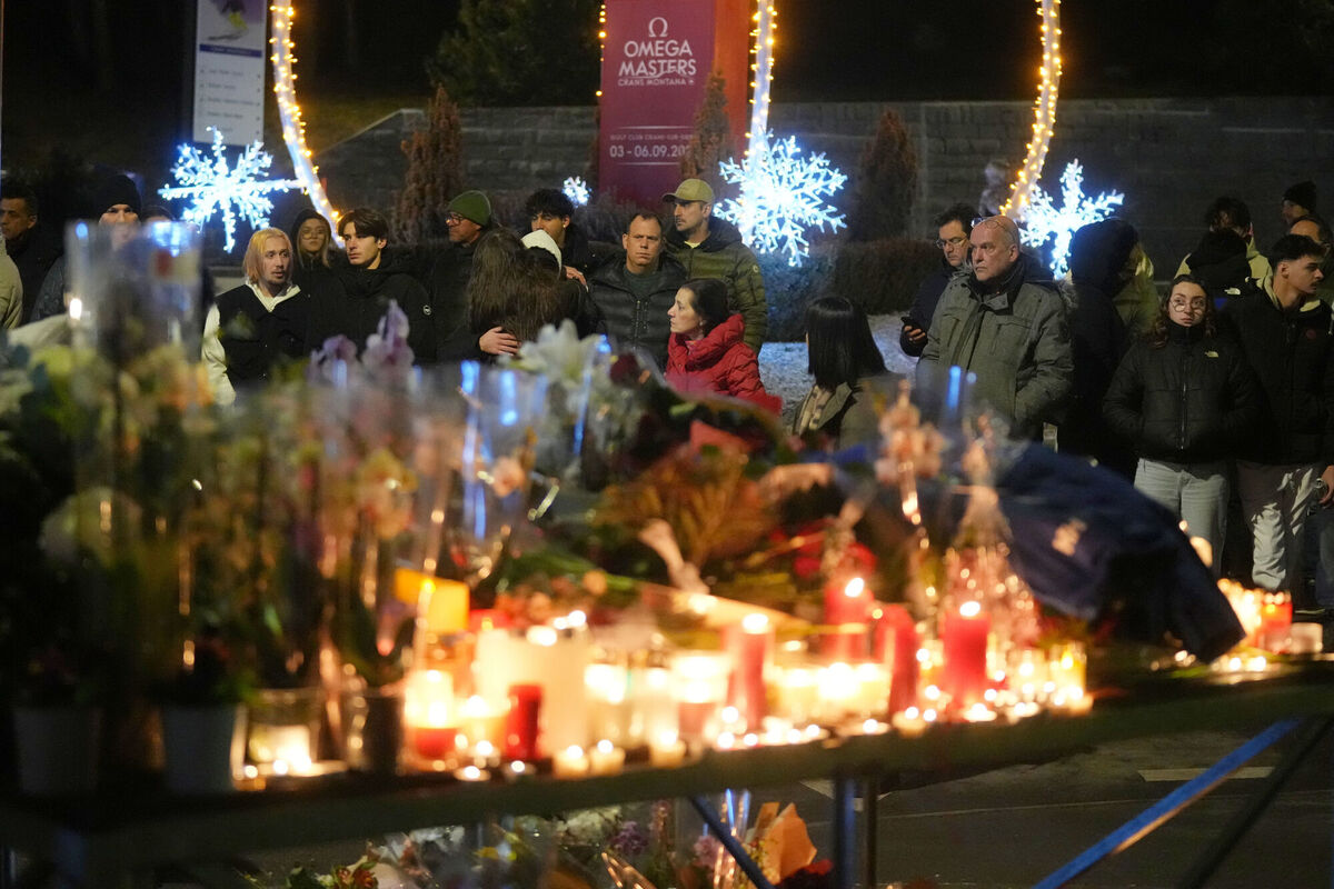 in Crans Montana, Italy, Thursday, Jan. 1, 2026. (AP Photo/Antonio Calanni)