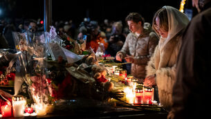 <p>Mourners gather to lay down flowers and light candles to remember the victims of the fire at the "Le Constellation" bar and lounge leaving people dead and injured, during New Year's celebration, in Crans-Montana, Switzerland, on Thursday, Jan. 1, 2026. (Alessandro della Valle/Keystone via AP)</p> <p>Mourners gather to lay down flowers and light candles to remember the victims of the fire at the "Le Constellation" bar and lounge leaving people dead and injured, during New Year's celebration, in Crans-Montana, Switzerland, on Thursday, Jan. 1, 2026. (Alessandro della Valle/Keystone via AP)</p>