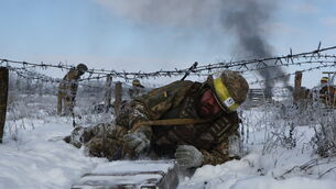 Recruits perform drills at a training ground in the Zaporizhzhia region, Ukraine (Andriy Andriyenko/Ukraine’s 65th Mechanized Brigade via AP)