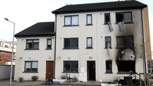 <p>The scene at Creston Avenue in Finglas on New Year's Eve after a house was set on fire in what gardaí now say was a case of mistaken identity. Picture: Leah Farrell/RollingNews</p>