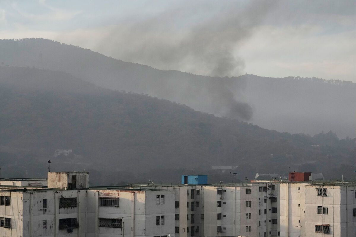 Smoke rises from Fort Tiuna, the main military garrison in Caracas, Venezuela, after multiple explosions were heard and aircraft swept through the area, Saturday, Jan. 3, 2026. (AP Photo/Matias Delacroix) Smoke rises from Fort Tiuna, the main military garrison in Caracas, Venezuela, after multiple explosions were heard and aircraft swept through the area, Saturday, Jan. 3, 2026. (AP Photo/Matias Delacroix)