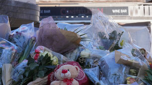 Tributes in front of the sealed off Le Constellation bar in Crans-Montana (Antonio Calanni/AP) Tributes in front of the sealed off Le Constellation bar in Crans-Montana (Antonio Calanni/AP)