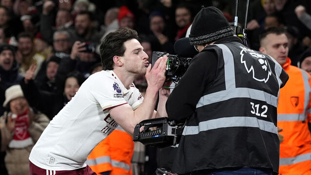 <p>Declan Rice kisses the camera after scoring his second goal against Bournemouth. Pic: Andrew Matthews/PA</p>