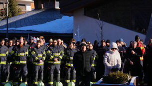 Firefighters joined mourners outside the Chapelle St-Christophe during the memorial Mass (Antonio Calanni/AP) Firefighters joined mourners outside the Chapelle St-Christophe during the memorial Mass (Antonio Calanni/AP)