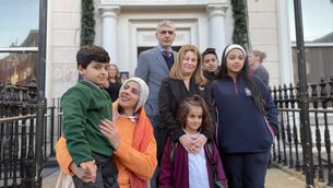 <p>Buchra Abdul-Bari holds her son Mohammed, six, and stands with her 14-year-old daughter Ghazal, 12-year-old son Zainaldeen and eight-year-old daughter Kinzy along with Palestinian ambassador Dr Jilan Wahba Abdalmajid at Children’s Health Ireland at Temple Street in Dublin (PA)</p>