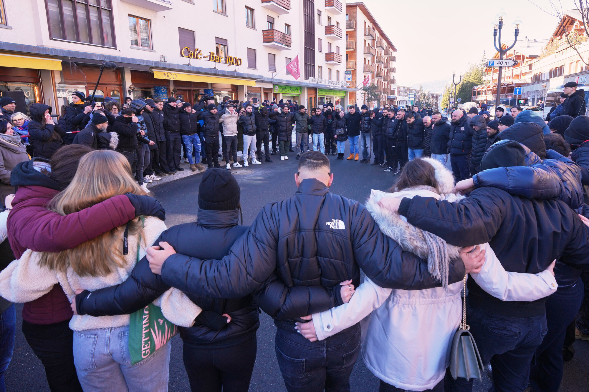 Hundreds march in silence to honour victims of Swiss bar fire