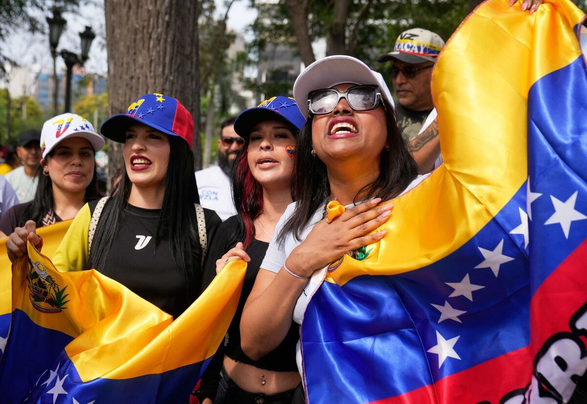 Venezuelans in Peru celebrate after US president Donald Trump announced that Venezuelan president Nicolas Maduro had been captured and flown out of the country. Picture: AP Photo/Martin Mejia