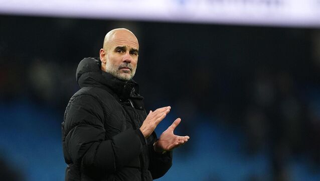 <p>Manchester City manager Pep Guardiola applauds the fans. Pic: Martin Rickett/PA Wire.</p>